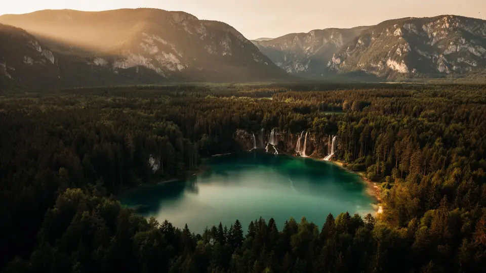 Emerald lake surrounded by forest and mountains near Banff, Canada